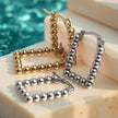 NAU EARRINGS | Steel and Cultured Pearls 