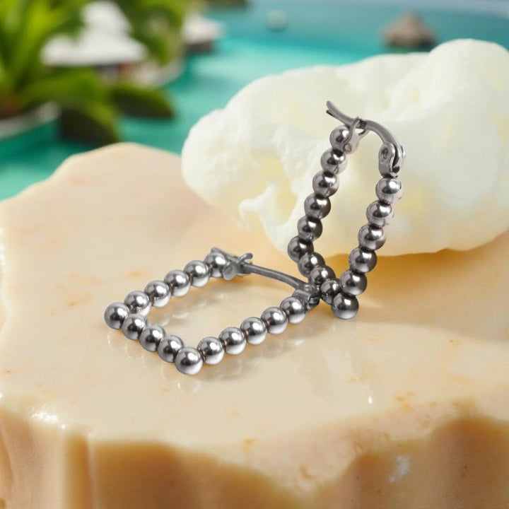 NAU EARRINGS | Steel and Cultured Pearls 